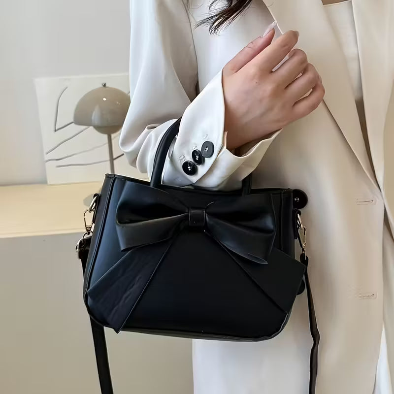 Elegante Bolso de Mano con Lazo Negro, diseño recién agregado