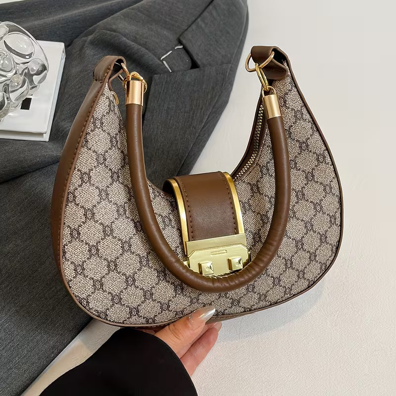 Nuevo bolso de hombro de primavera de moda vintage versátil de gama alta para mujeres