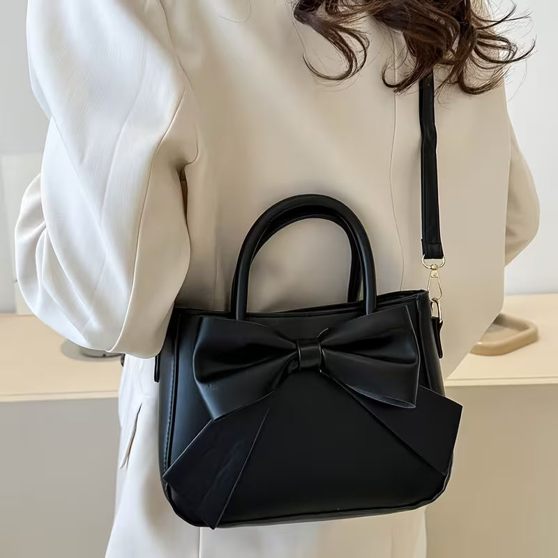Elegante Bolso de Mano con Lazo Negro, diseño recién agregado