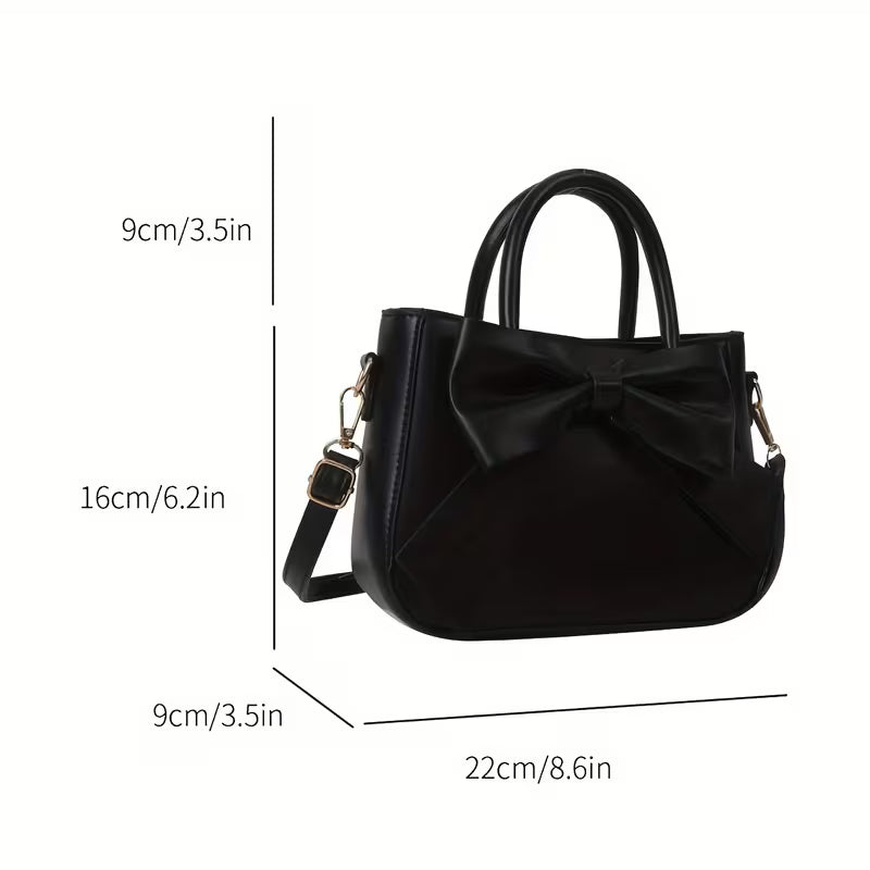 Elegante Bolso de Mano con Lazo Negro, diseño recién agregado