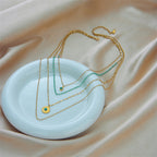 Collar con colgante en acero inoxidable y perlas