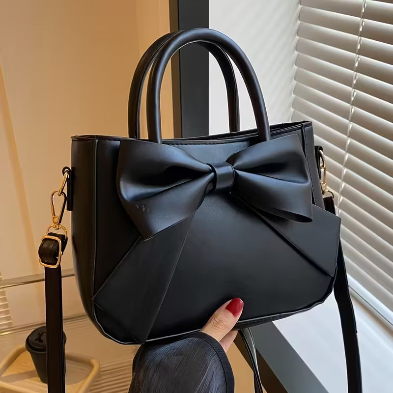Elegante Bolso de Mano con Lazo Negro, diseño recién agregado